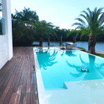 Ipe hardwood pool deck with matching ipe dock overlooking the intercostal